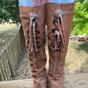 Suede-like boots.  Worn, but still have life left in them.   Photos show wear.